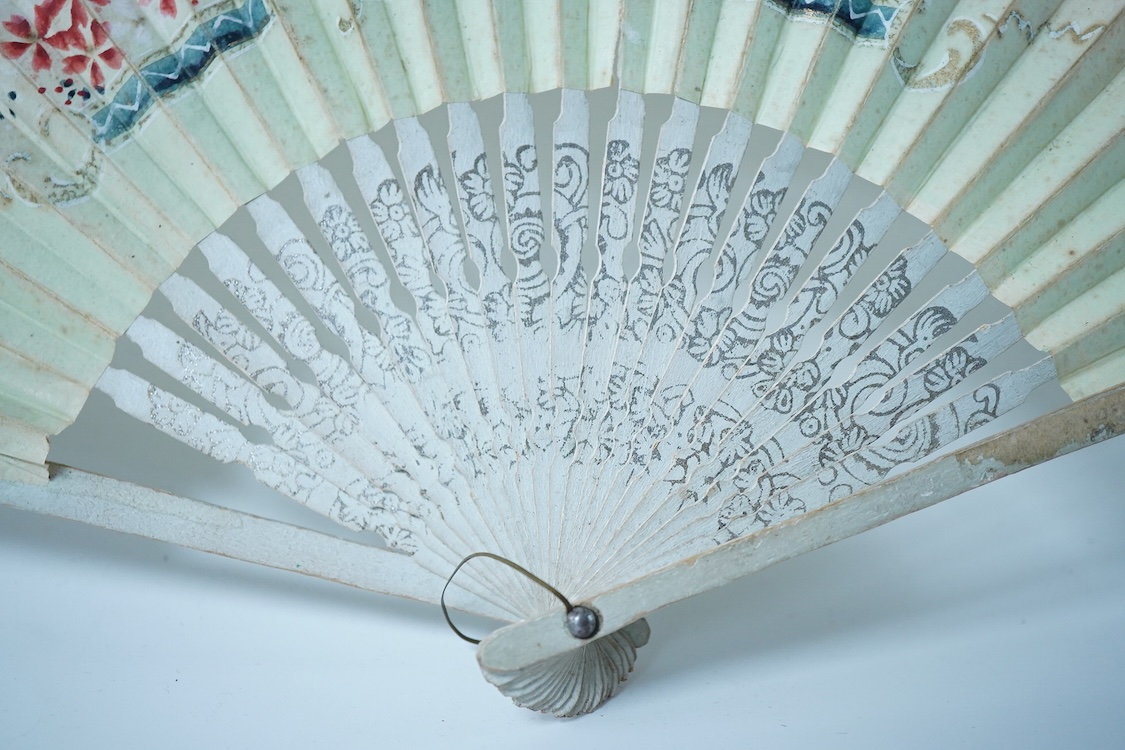 A collection of 19th century and later fans to include a black lacquered and lace example and a hand painted floral example